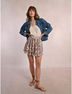 Falda corta con estampado y...